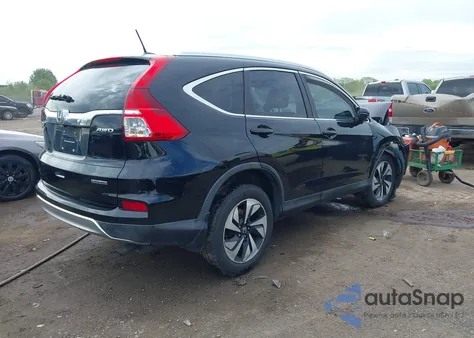 2015 Honda Cr-V Touring z USA, uszkodzony, nr VIN 5J6RM4H98FL078503